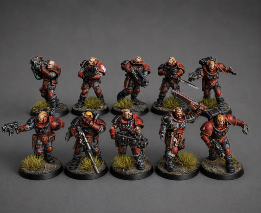 Hand-painted squad of 5 Space Marine scout miniatures in red and black armor with grass tuft basing, game-level tabletop commission by Alto Studio